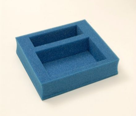 Custom foam box insert in blue PU foam. Box foam inserts made to spec.